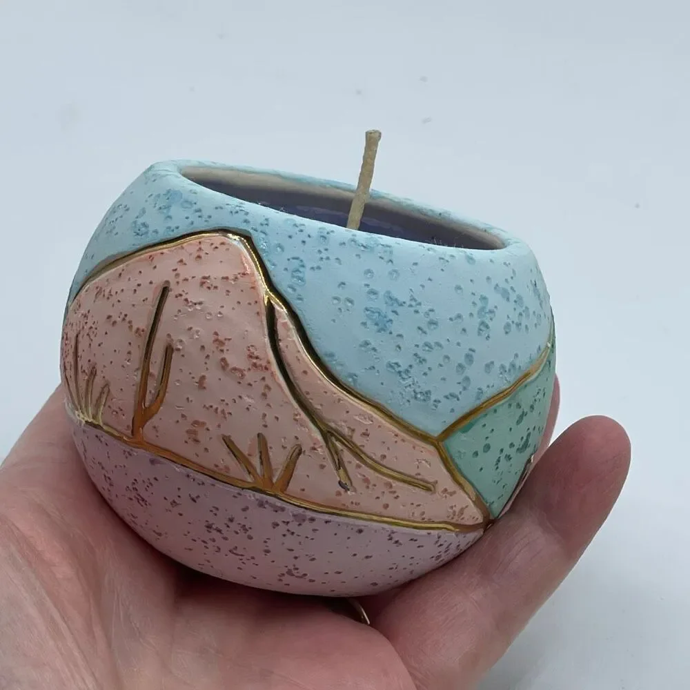 Handcrafted ceramic candle Southwestern landscape theme 22K gold accents